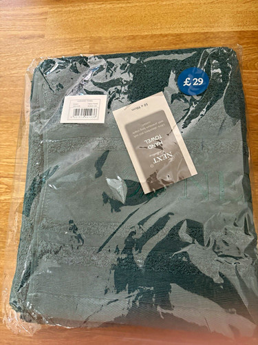 Next green cotton logo - next, hand